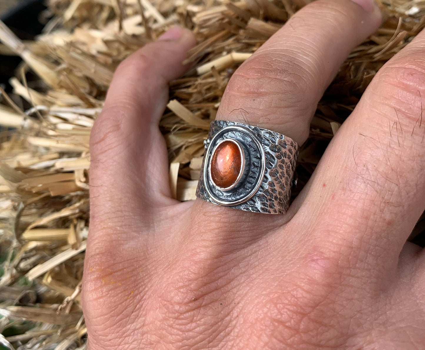 Adjustable sunstone ring