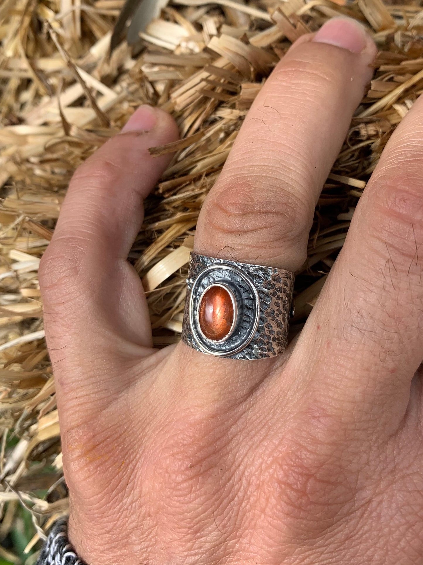 Adjustable sunstone ring